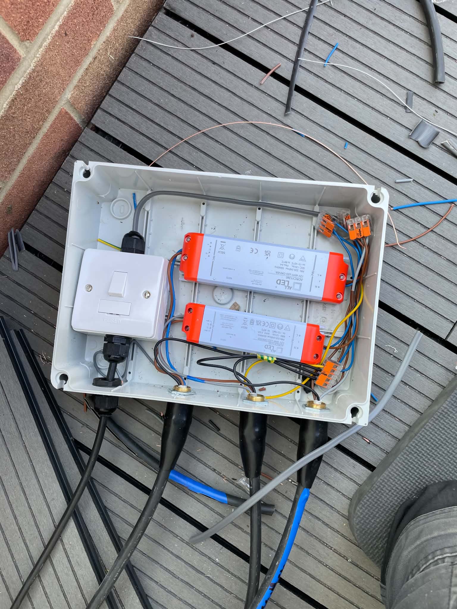 Open electrical consumer unit with LED drivers and wiring